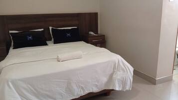 Deluxe Double Room, Patio, Courtyard View | In-room safe, desk, laptop workspace, soundproofing
