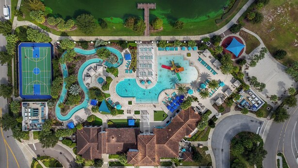 An aerial view of a resort with multiple swimming pools, a tennis court, and a variety of outdoor seating areas. - Cinderella’s Castle Retreat, Private Pool, Pokémon Room, Minutes to Disney! (Four Corners)