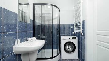 Shower, free toiletries, hair dryer, towels