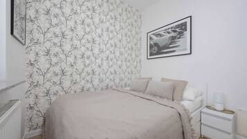Iron/ironing board, travel crib, WiFi, bed sheets