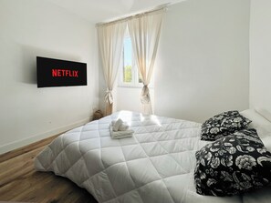 2 chambres, fer et planche à repasser, Wi-Fi, draps fournis