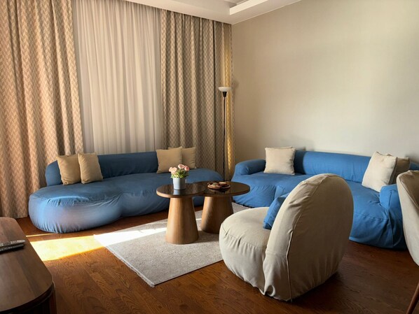 Superior Apartment, Balcony, City View | Living area - Tranquil (6th of October City)