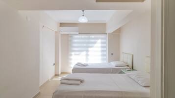 Apartamento, vista para a cidade, no jardim | Ferros/tábuas de passar roupa, Wi-Fi de cortesia