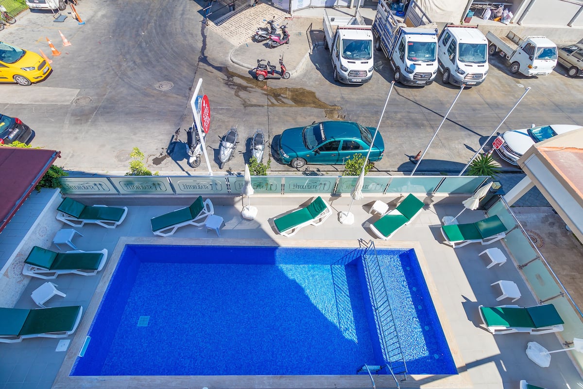 Apartment, Pool View, Garden Area | Iron/ironing board, free WiFi