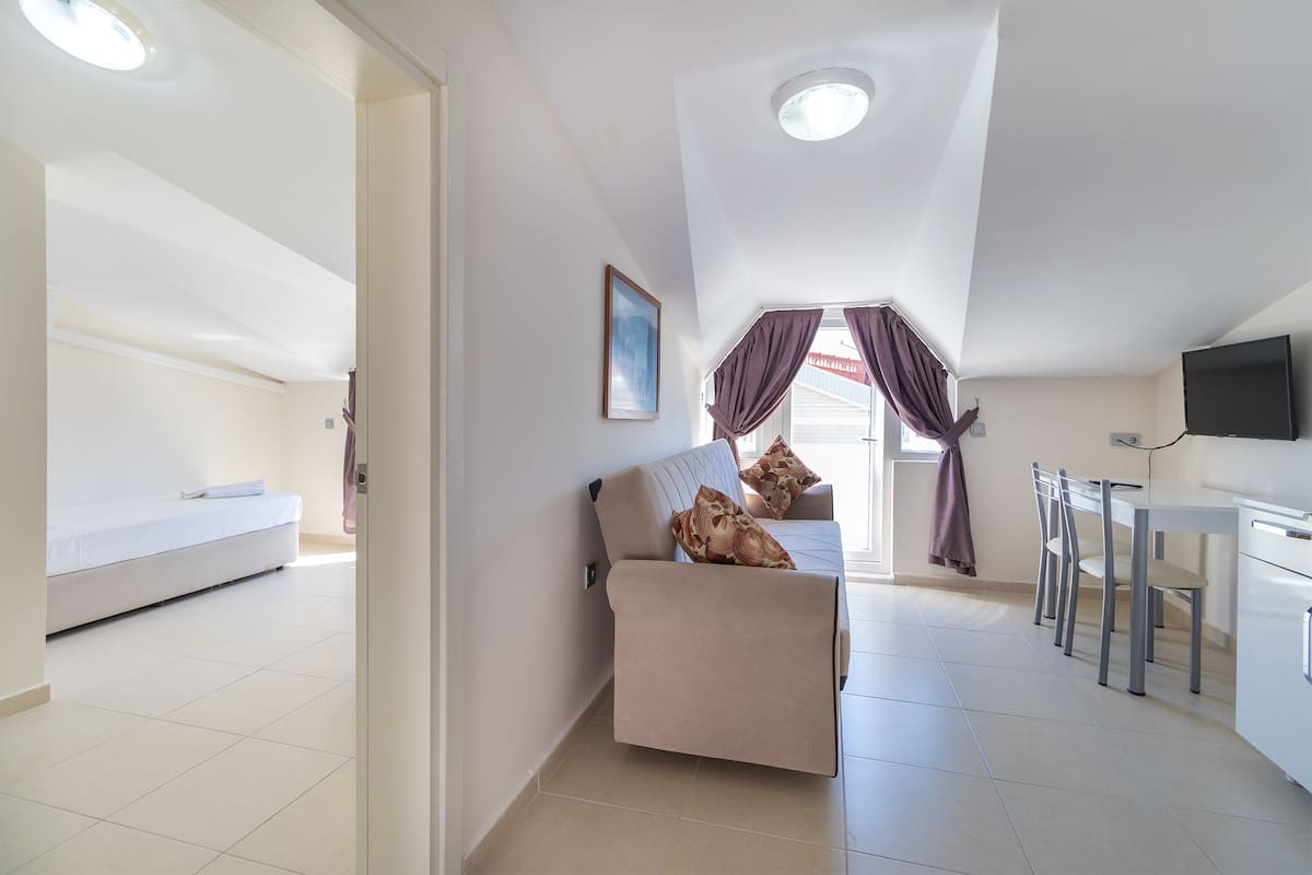 Apartment, Courtyard View, Garden Area | Iron/ironing board, free WiFi