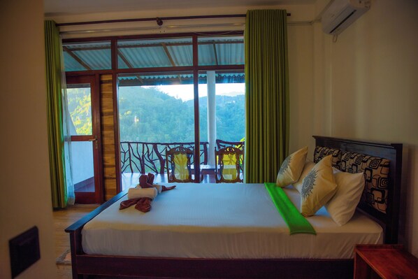 Deluxe Double Room, Balcony, Mountain View | Individually furnished, desk, laptop workspace, free WiFi