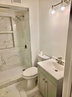 Hair dryer, towels, toilet paper