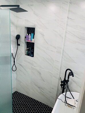 Shower, hair dryer, towels, soap