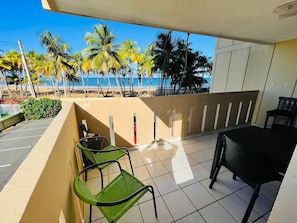 Outdoor dining - Ocean Front two bedroom apartment with AC through it , in Luquillo PR. (Luquillo)