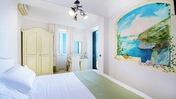 Standard Double or Twin Room, Patio, Sea View | Frette Italian sheets, premium bedding, down duvets, memory-foam beds