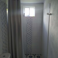 Standard Quadruple Room | Bathroom | Shower, towels, soap, shampoo