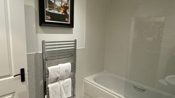 Hair dryer, towels, soap, toilet paper