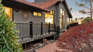 A house with a balcony, a satellite dish, and a large window. - Luxury Desert Retreat w/ Hot tub + Fire Pit! (Sedona)