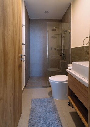 Shower, hair dryer, towels, soap