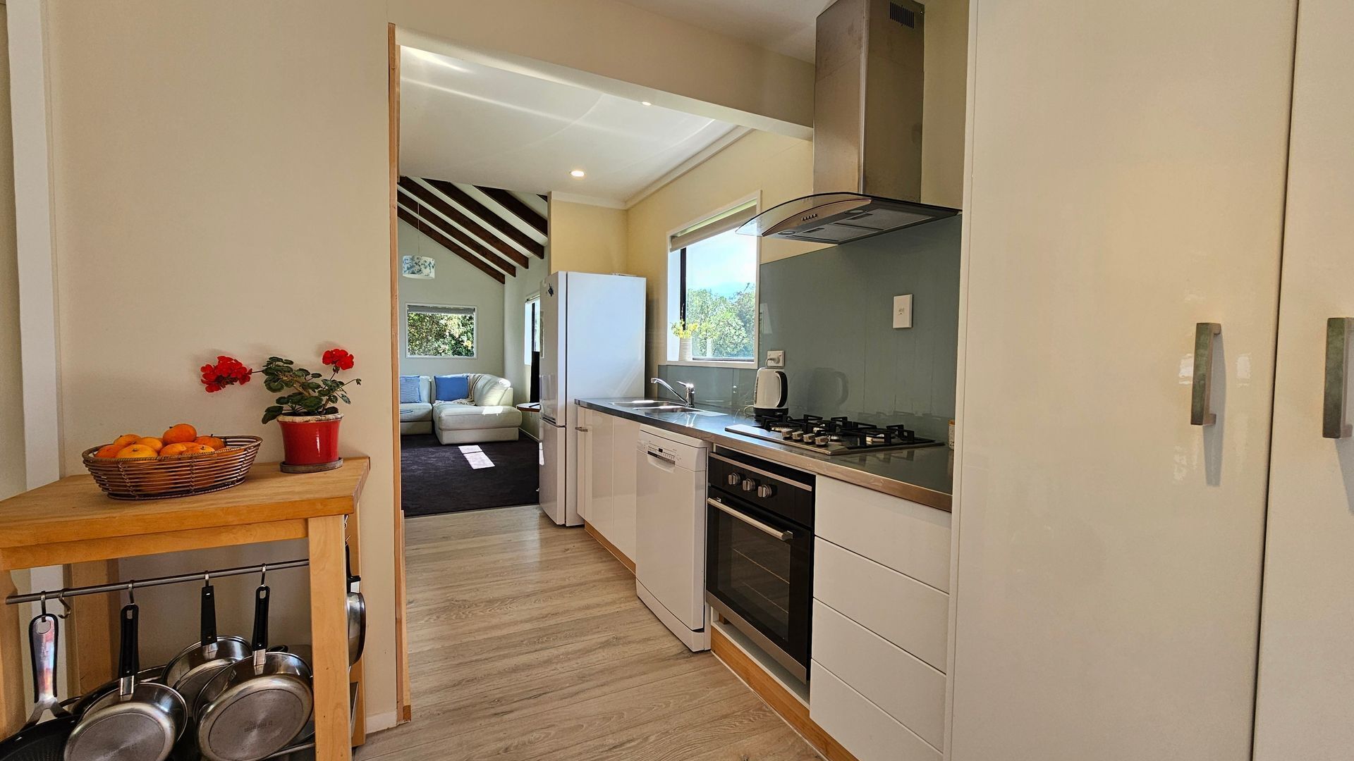 Fridge, oven, toaster, dining tables