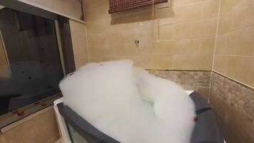 Hair dryer, towels, soap, shampoo