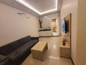 Apartament familiar, vistes a la muntanya | Sala d'estar