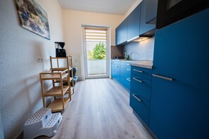 Kylskåp, ugn, spishäll och diskmaskin