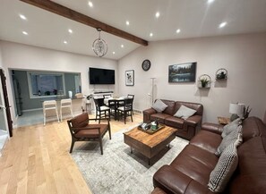 Smart TV, fireplace, books, stereo