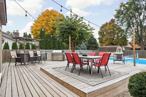 Outdoor dining - Updated 4 BR Home, Pool, Hot Tub, Game Room (Greenwood)