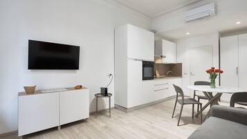 Apartemen Keluarga | Area keluarga | Smart TV 40-inci dengan saluran TV digital dan Netflix
