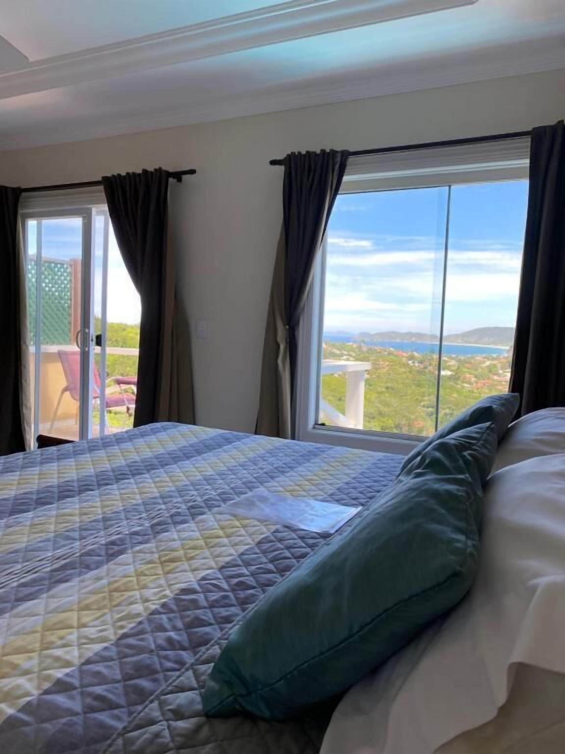 Luxury Studio Suite, Balcony, Sea View | In-room safe, blackout drapes, soundproofing, iron/ironing board