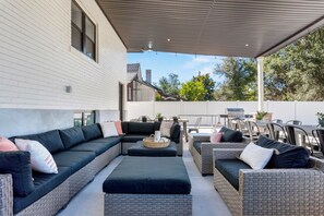 Outdoor dining - Luxurious 7BR/4BA retreat! Hot Tub, Fire Pit, Arcade Games, Huge Covered Patio (Provo)