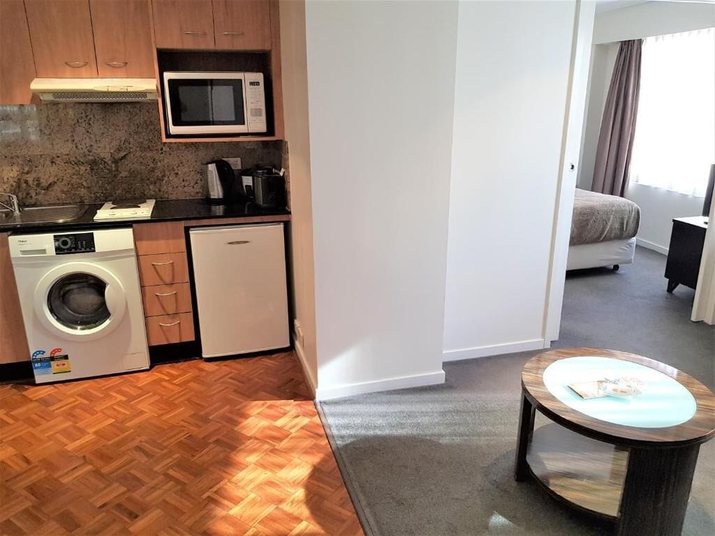 Apartment, 1 Bedroom | In-room safe, desk, laptop workspace, iron/ironing board