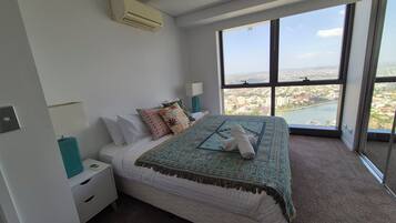 Design Apartment, River View | Blackout drapes, iron/ironing board, free WiFi