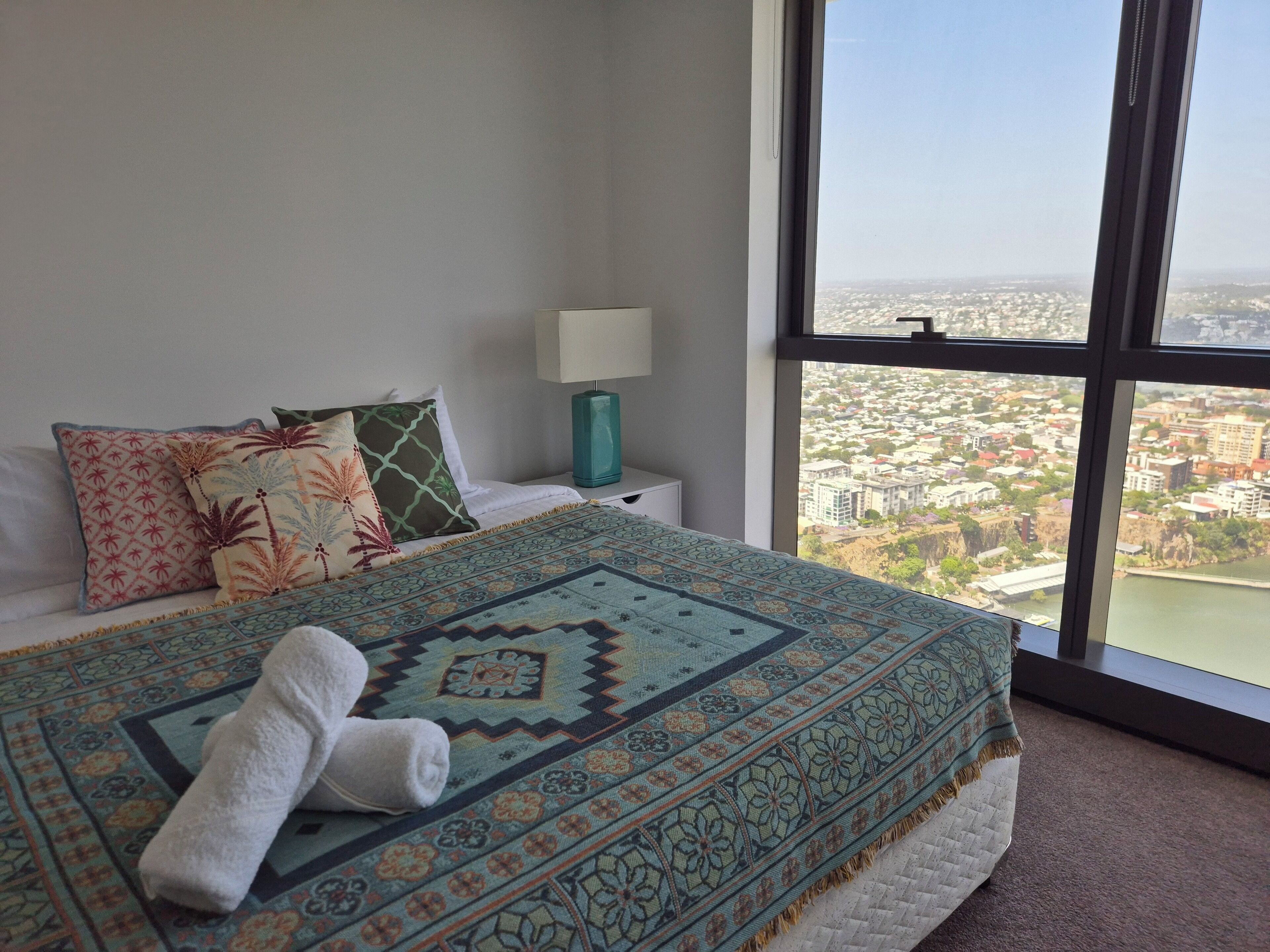 Design Apartment, River View | Blackout drapes, iron/ironing board, free WiFi