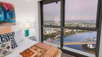 Design Apartment, River View | Egyptian cotton sheets, premium bedding, blackout drapes