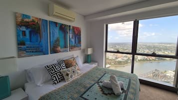 Design Apartment, River View | Blackout drapes, iron/ironing board, free WiFi