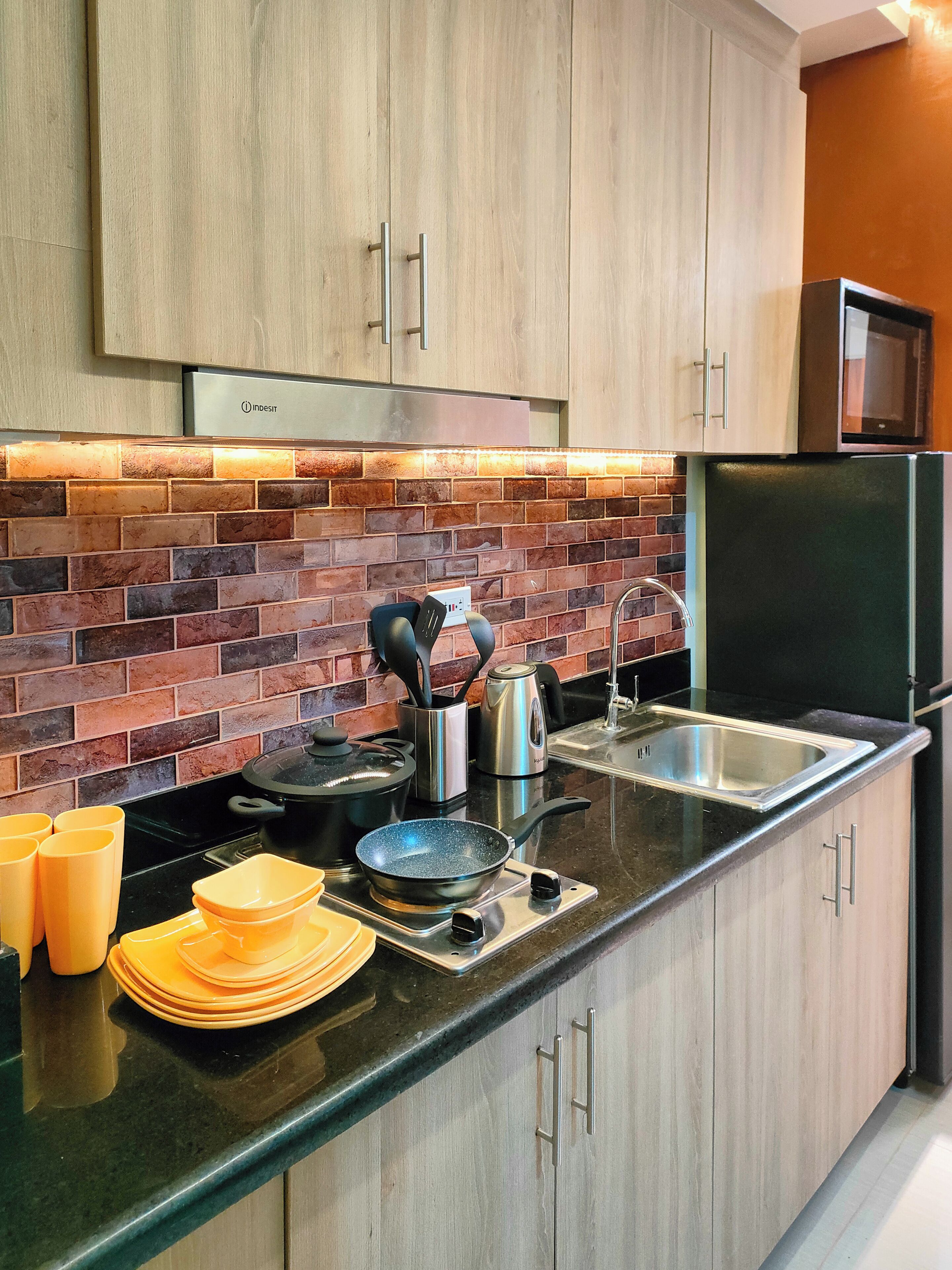 Condo, Balcony, Pool View | Private kitchenette