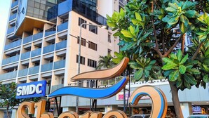 A building with a sign reading "SMDC Shore 2" and a large number "2" in the foreground. - Reminisce Staycation  (Pasay)