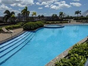 Room, 2 Bedrooms, Balcony, Pool View | Pool | Outdoor pool - Room-cozy Place Near Eastwood (Pasig)