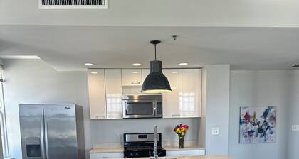 Modern Downtown Luxury Condo W/ City View, Gym & Theatre Near UAB + Restaurants