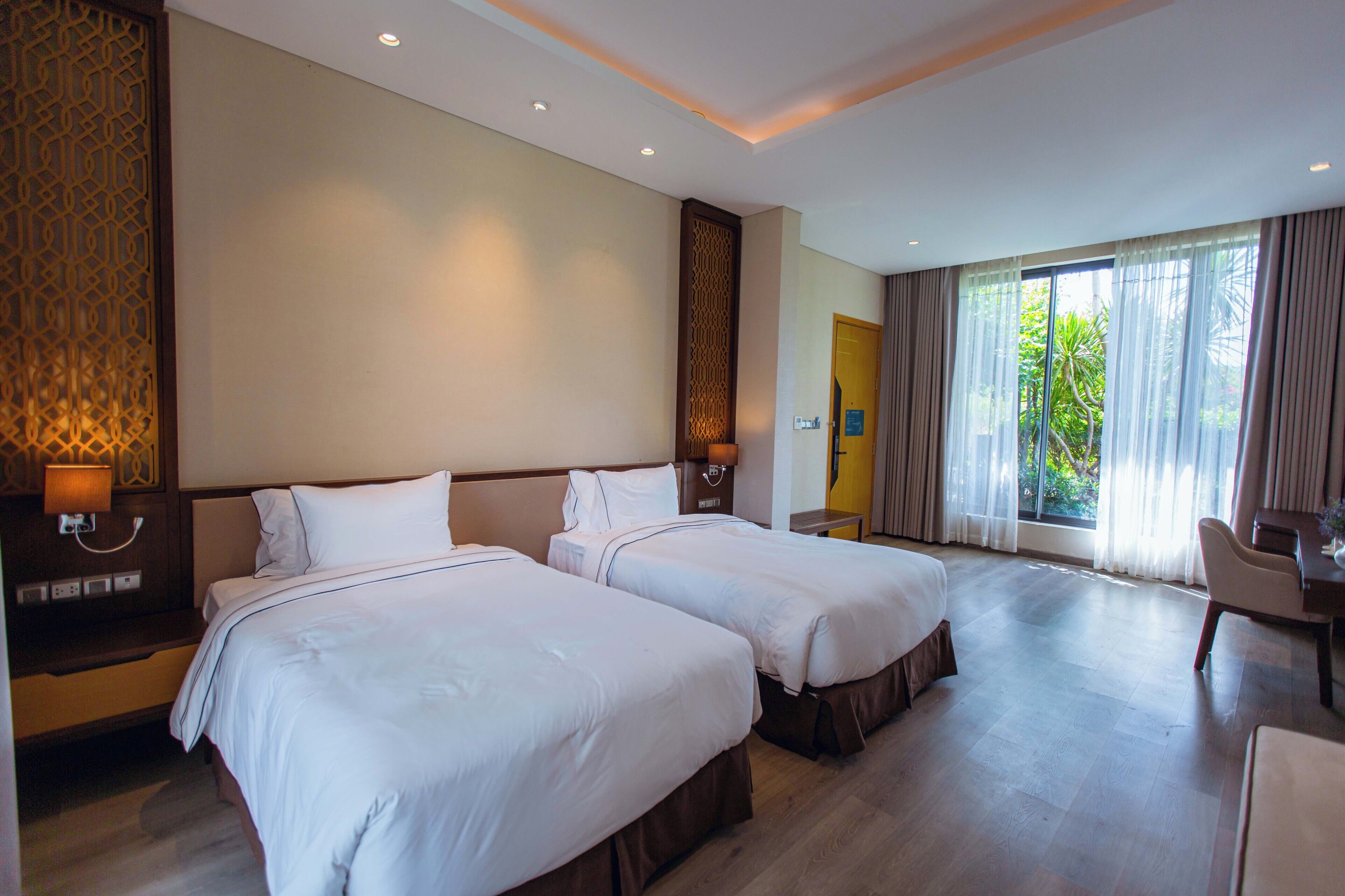 Chambre Classique, balcon, vue piscine | Coffres-forts dans les chambres, bureau, Wi-Fi gratuit