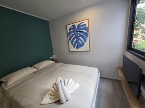 Apartamento | Caja fuerte, cortinas opacas, tabla de planchar con plancha