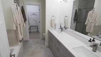 Shower, jetted tub, hair dryer, towels