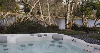 Waterfront • Dock • Hot Tub • Basketball Court