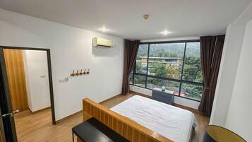 Apartment, Balcony, Mountain View | In-room safe, blackout drapes, iron/ironing board, free WiFi