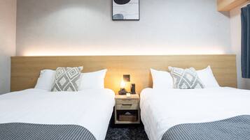 Luxe penthouse, uitzicht op de stad | Een bureau, een laptopwerkplek, verduisterende gordijnen, gratis wifi