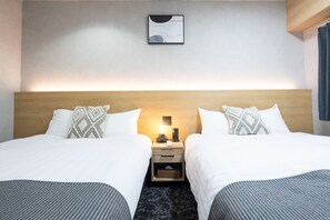 Luxe penthouse, uitzicht op de stad | Een bureau, een laptopwerkplek, verduisterende gordijnen, gratis wifi