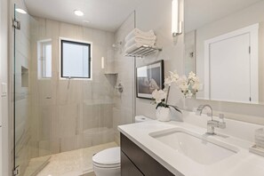 Shower, hair dryer, soap, shampoo