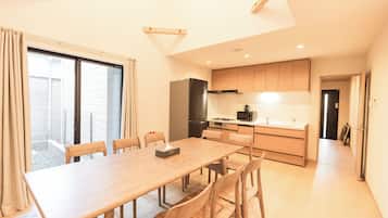 Deluxe Villa, Courtyard View | Living room | 40-inch flat-screen TV with digital channels