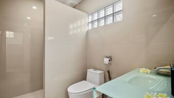 Comfort Room, Garden View | Bathroom | Shower, hair dryer, towels, soap
