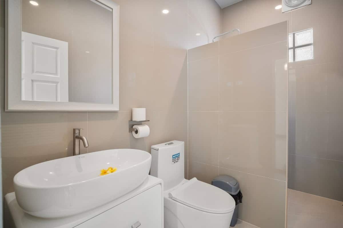 Family Double Room, Pool View | Bathroom | Shower, hair dryer, towels, soap