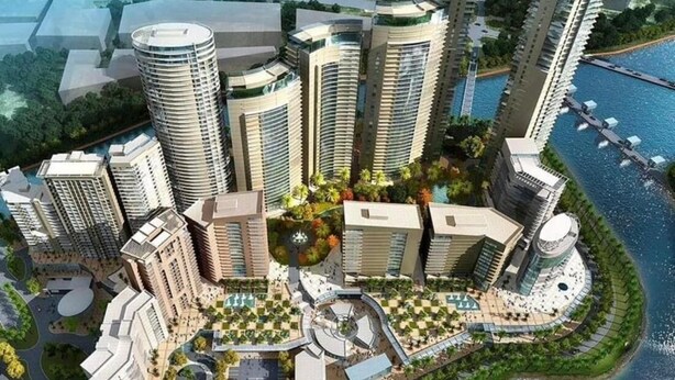 A high-rise residential complex with multiple buildings, a central landscaped area, and a waterfront. - Cozy Place near Eastwood (Quezon City)