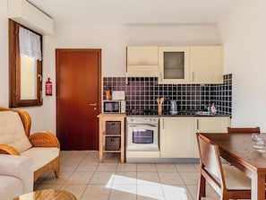 Fridge, microwave, oven, cookware/dishes/utensils