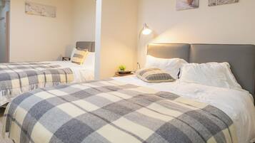 Family Room, Balcony, City View | Blackout drapes, free WiFi